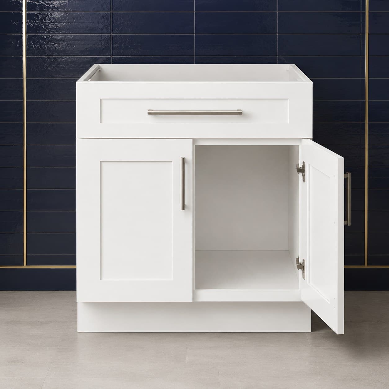 36 inch sink base cabinet showing double doors below a false drawer panel, all-wood frame sized for undermount or drop-in sinks, in Purity White finish — front view
