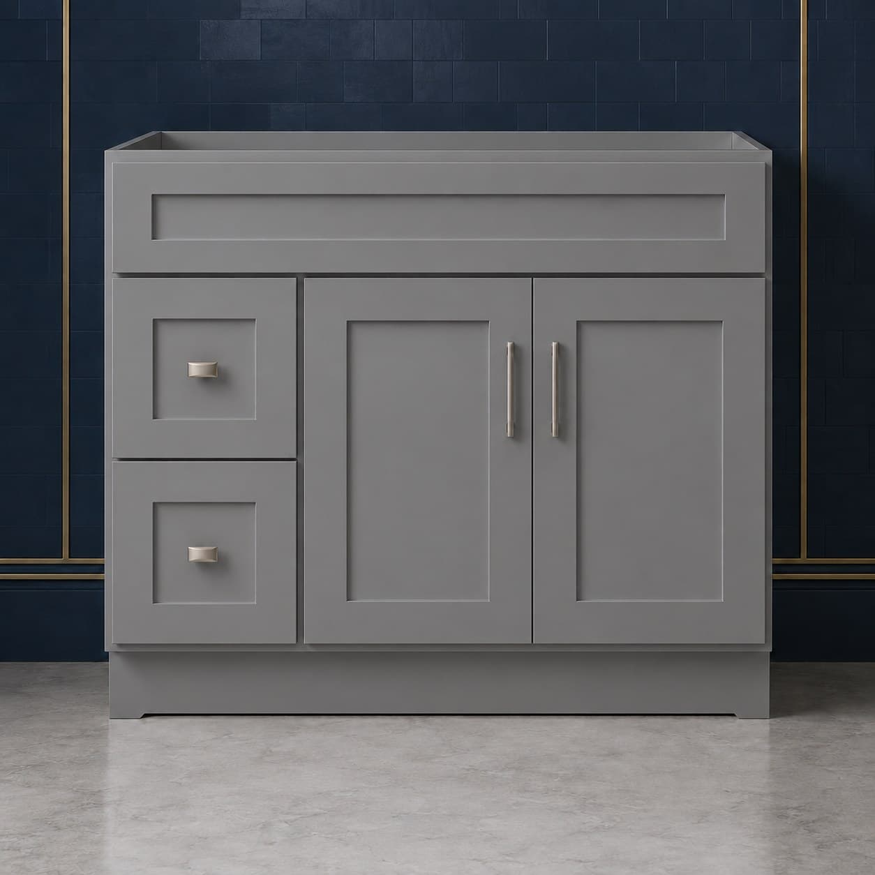 42-inch wide vanity sink base cabinet with a left-side two-drawer stack beside two shaker-style doors topped by a false drawer front, neutral finish, in Modern Gray finish — front view