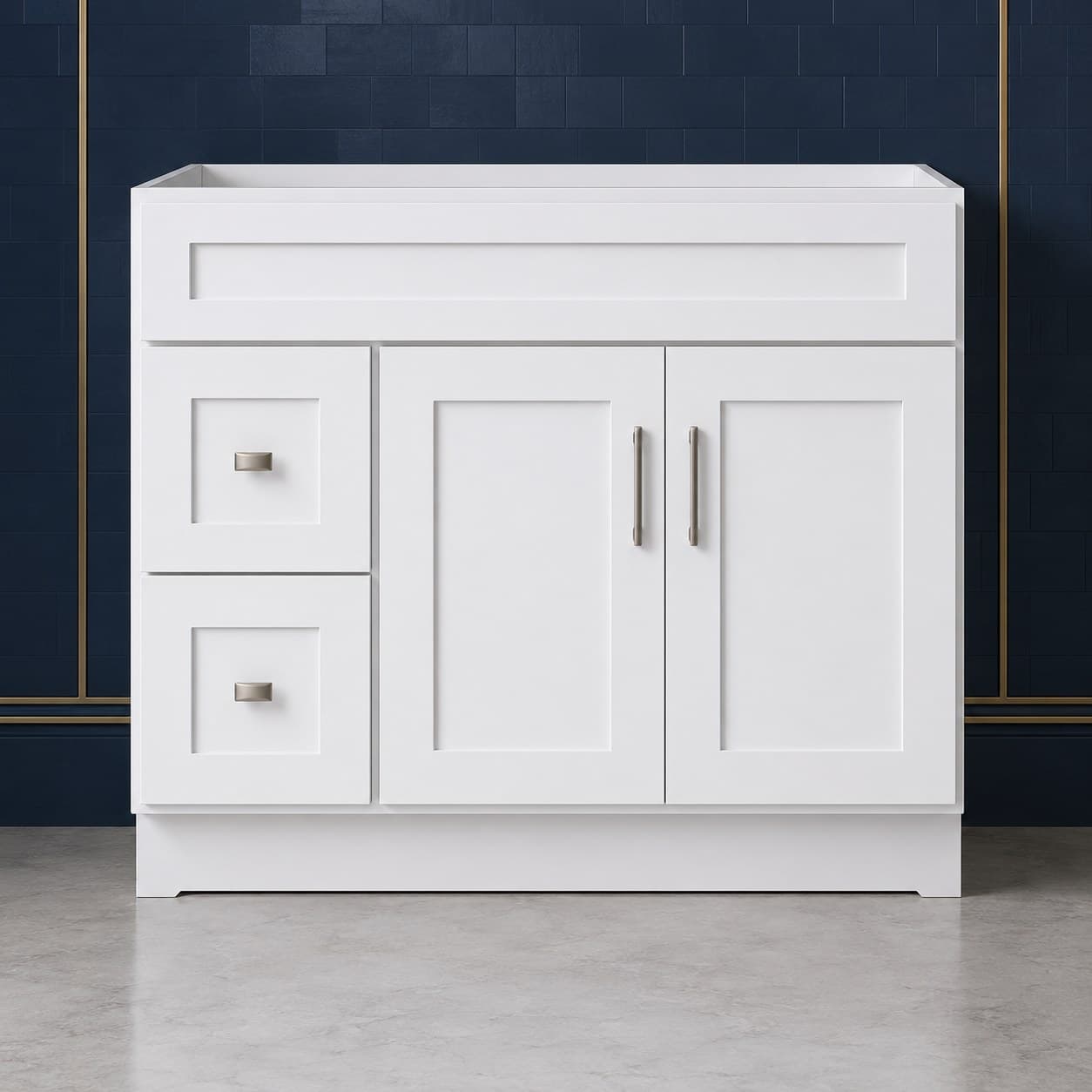 42-inch wide vanity sink base cabinet with a left-side two-drawer stack beside two shaker-style doors topped by a false drawer front, neutral finish, in Purity White finish — front view
